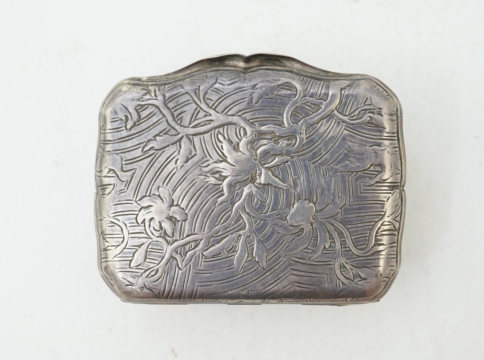 An early 19th century French white metal snuff box, with hinged cover